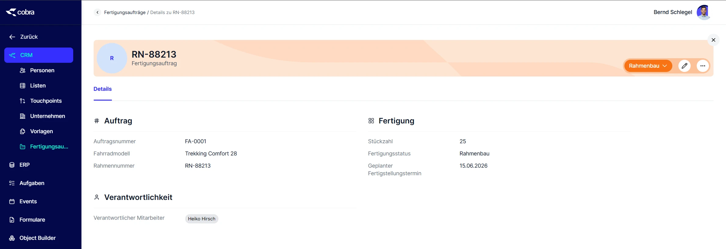 Detailseite eines Fertigungsauftrags mit farbigem Status im Kopfbereich
